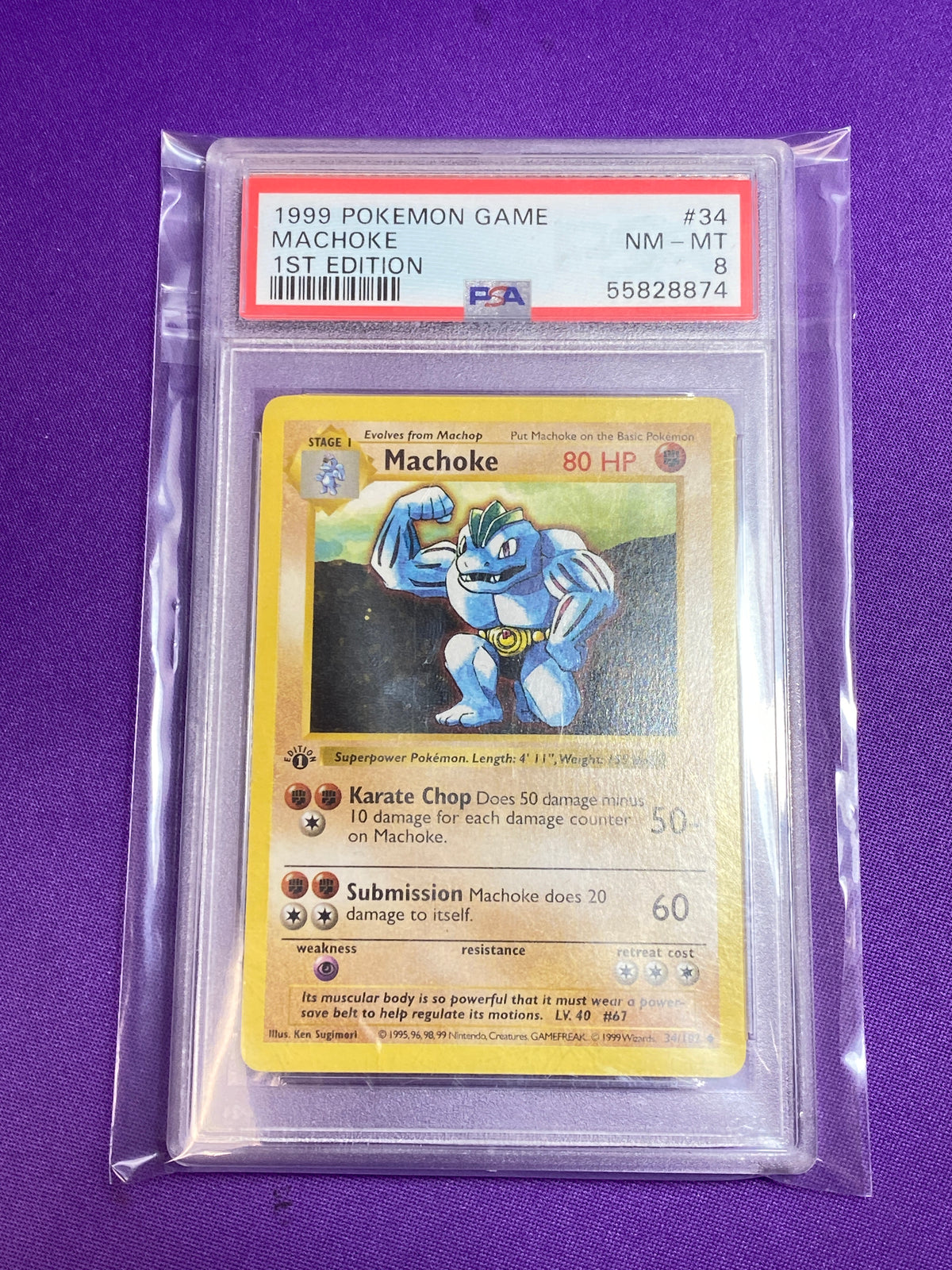 PSA 8 Machoke 1st Edition #34 (Cabinet)