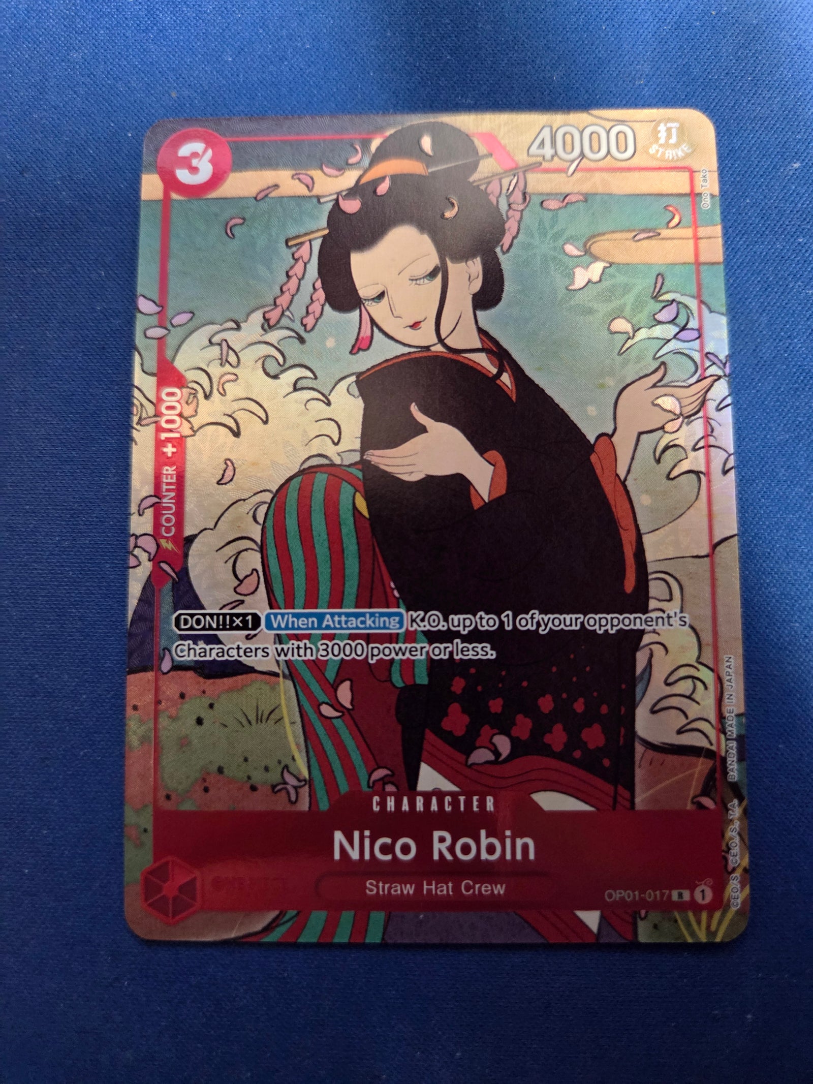 Nico Robin (English Version 1st Anniversary Set) (OP01-017) - One Piece Promotion Cards Foil (Cabinet-NM))