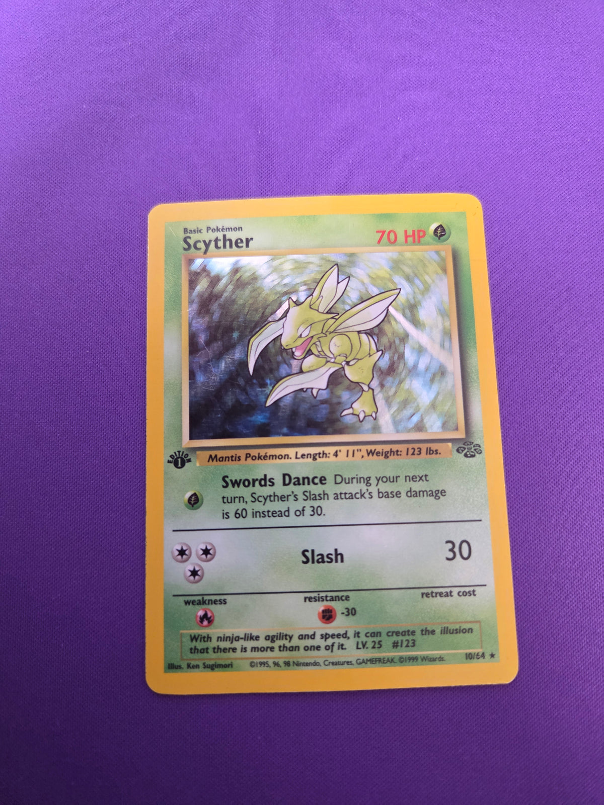 Moderately Played Scyther 1st Edition 10/64 Holofoil (Cabinet-MP)