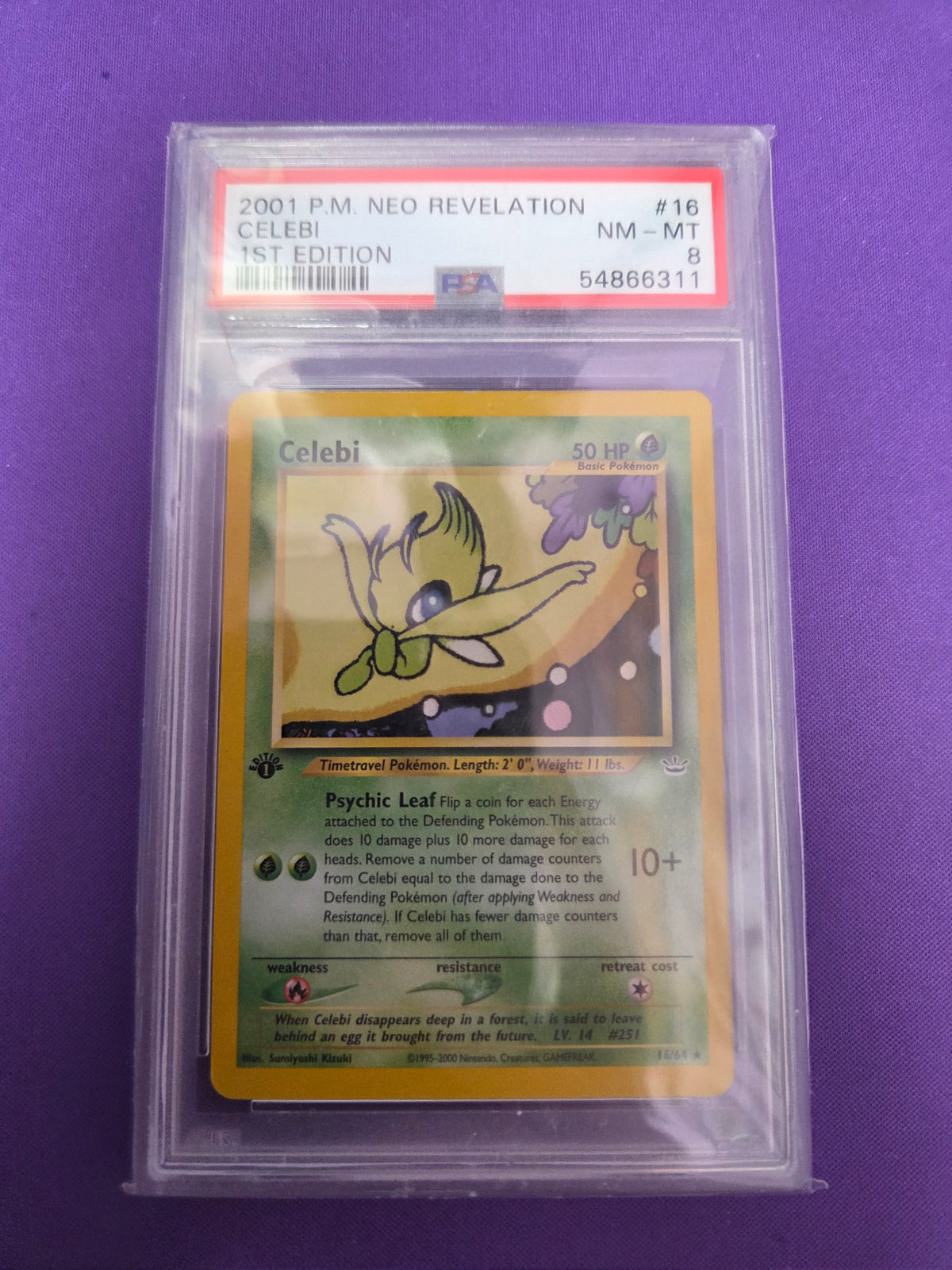 PSA 8 Celebi Neo Revelation 1st edition #16 (Cabinet)