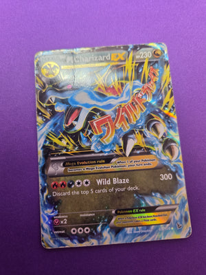 Damaged M Charizard EX (X) (69)/106 Ultra Rare Holofoil (Cabinet-DMG)