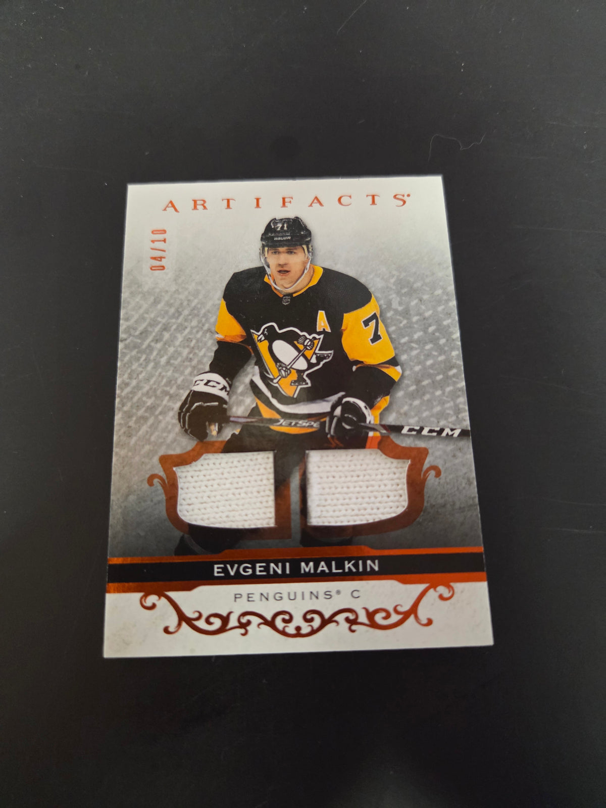 Evgeni Malkin [Material Orange] #135 2021 Upper Deck Artifacts 4/10 (cabinet-NM)