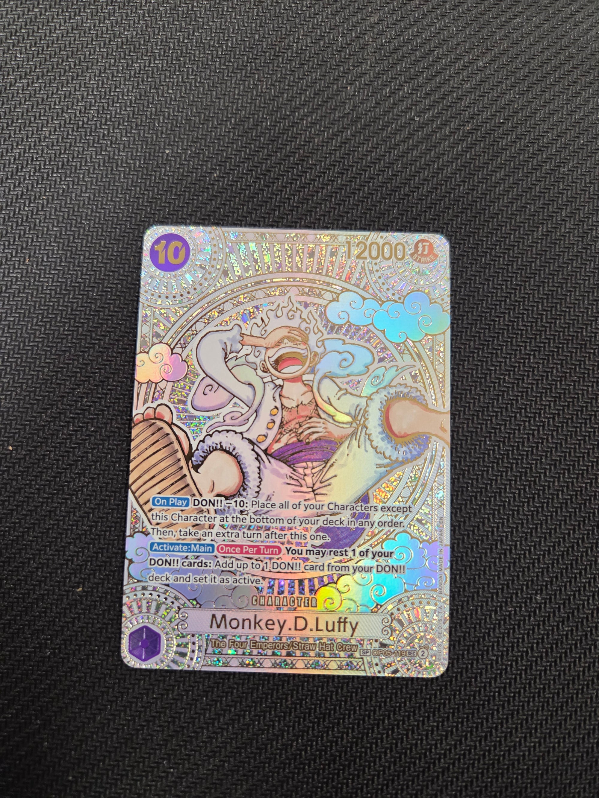 Monkey.D.Luffy (119) (SP) (Gold) (OP05-119) - A Fist of Divine Speed Foil (Cabinet-NM)