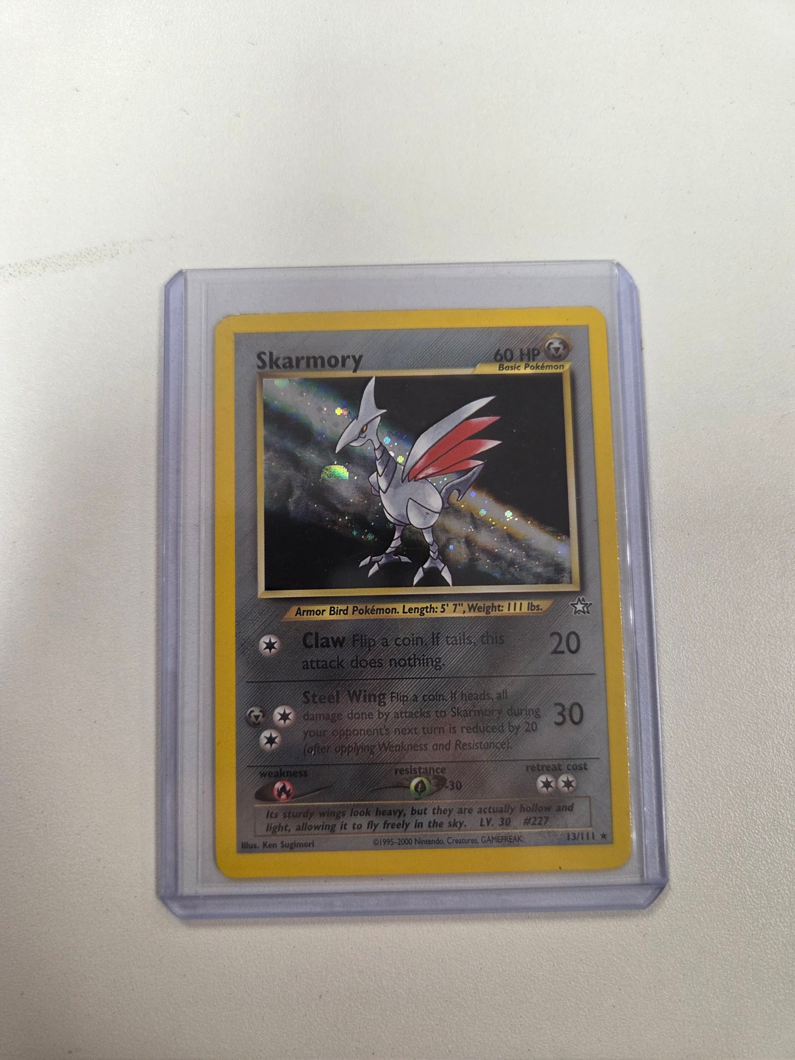 Lightly played Skarmory (13)/111 Holo Rare Unlimited Holofoil (Cabinet-LP)