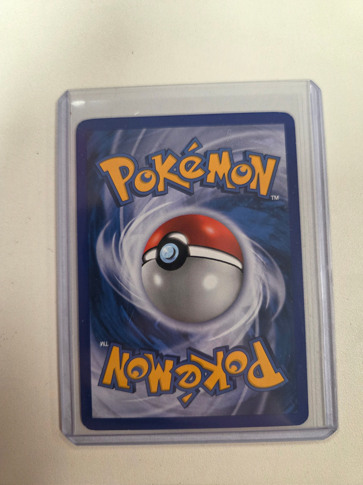 Blastoise (2)/132 Bleed Holo error with spiral on bottom left (Cabinet-LP)