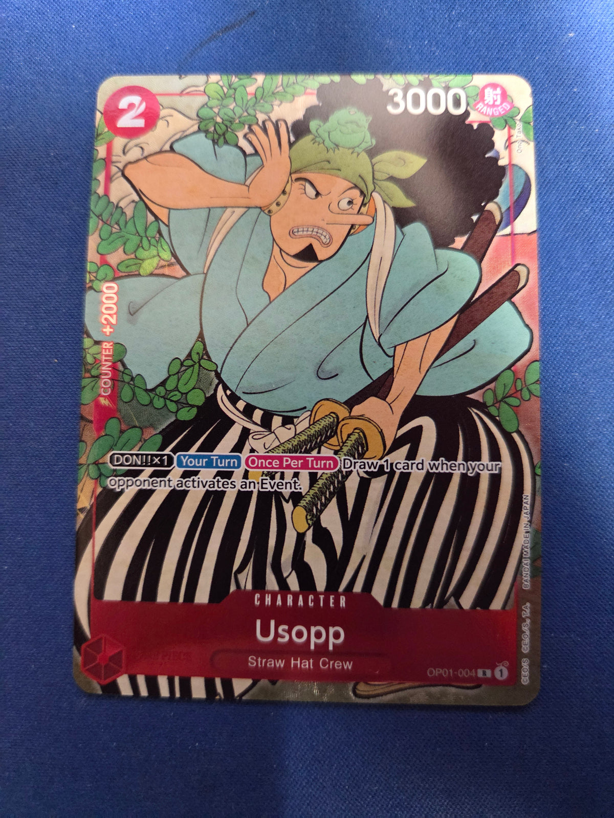 Usopp (English Version 1st Anniversary Set) (OP01-004) - One Piece Promotion Cards Foil (Cabinet-NM)