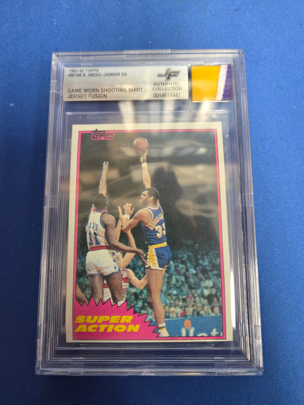 Beckett Authentic Kareem Abdul Jabbar #W106 game worn shooting shirt patch (Cabinet)