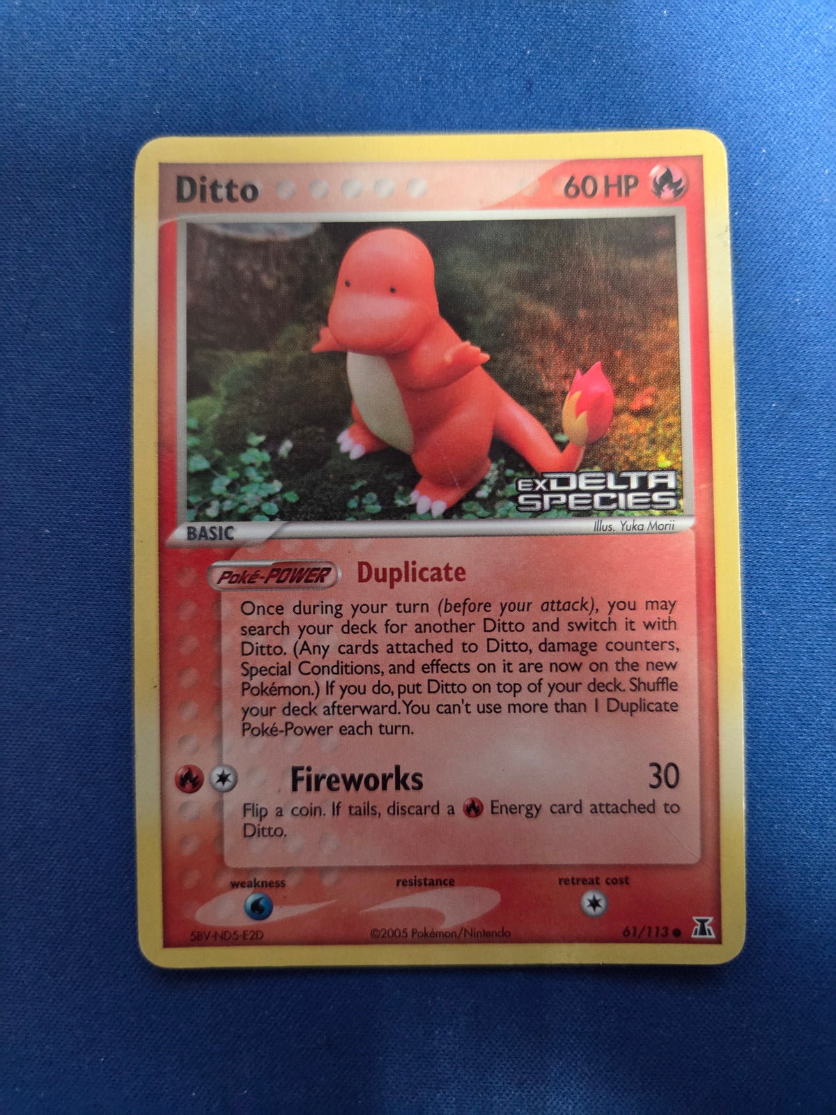 Moderetly Played Ditto - 61/113 (Charmander) (61)/113 Common Reverse Holofoil (Cabinet-NM)