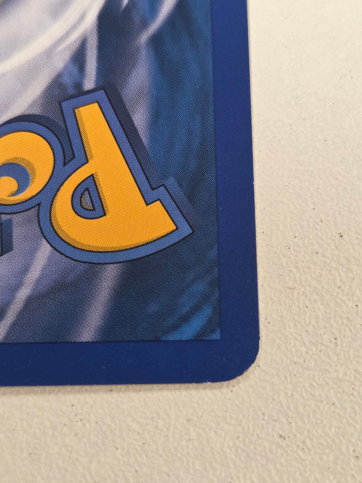 Blastoise (2)/132 Bleed Holo error with spiral on bottom left (Cabinet-LP)