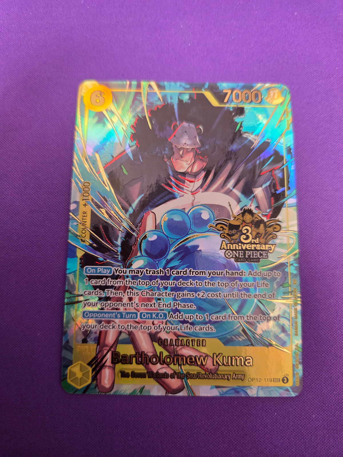 Bartholomew Kuma (Japanese Version 3rd Anniversary Set) (OP12-119) - One Piece Promotion Cards Foil (Cabinet-NM)