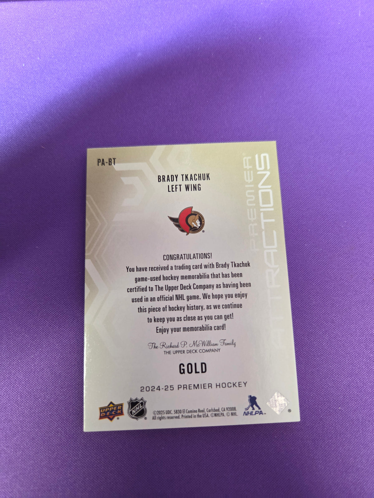 Brady Tkachuk Premier Attractions 7/35 Gold #PA-BT (cabinet)