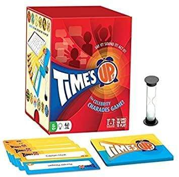 a stack of books and a book on a table 